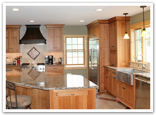 Cherry kitchen with custom range hood